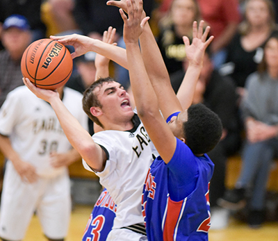 clas strasner fighting through hands for layup