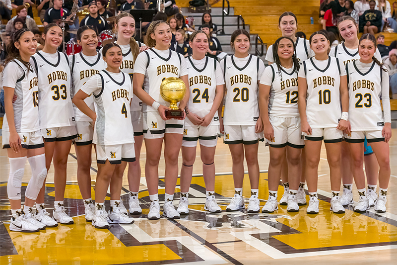 team holding trophy